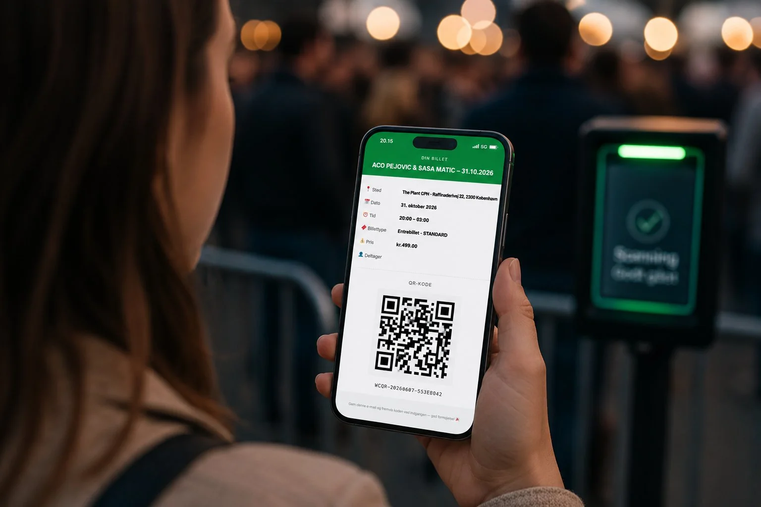 Festival attendee scanning WooCommerce event ticket QR code at venue entrance